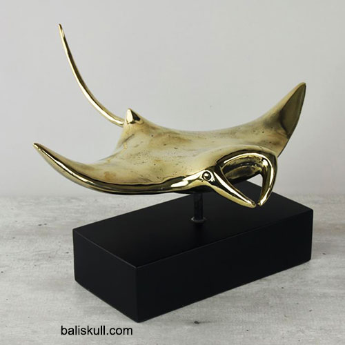 fish statue made of brass