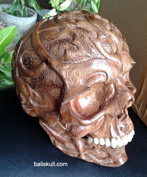 skull made of wood mixed with bones by Bali Skull